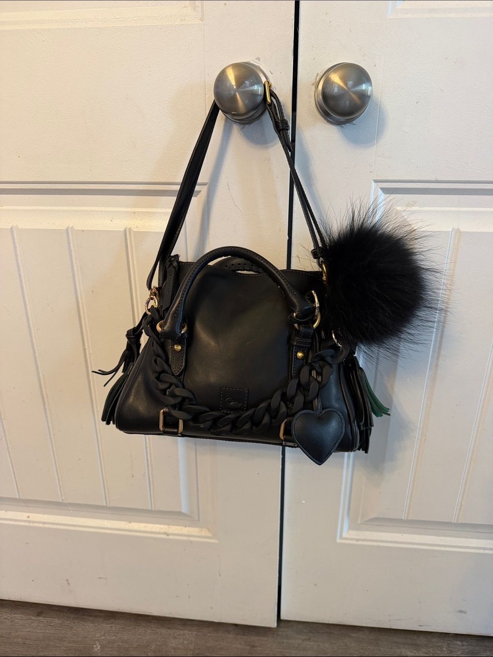 Dooney & Bourke Black Leather Crossbody Satchel with Pom Pom Charm